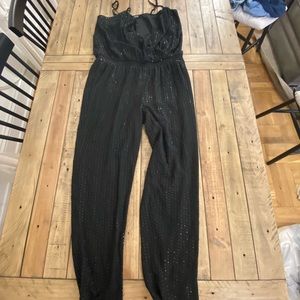 Black Express sequenced pants onsie.